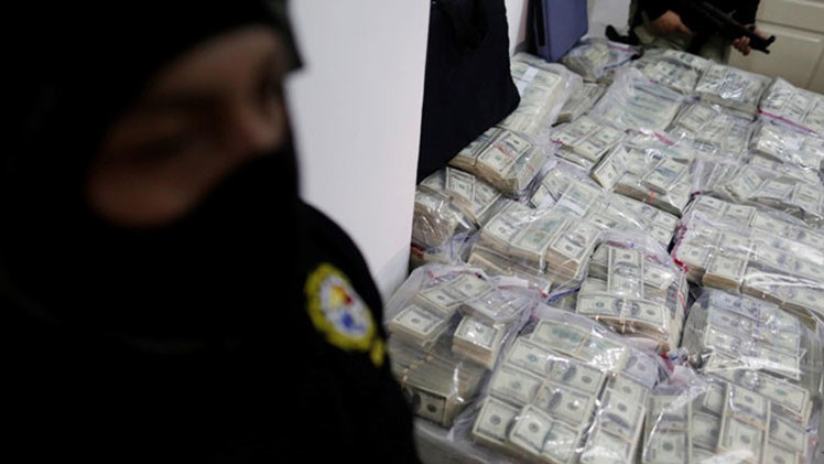 Narcotraficantes colombianos y mexicanos crean 'bancos callejeros' para blanquear dinero en Honduras
