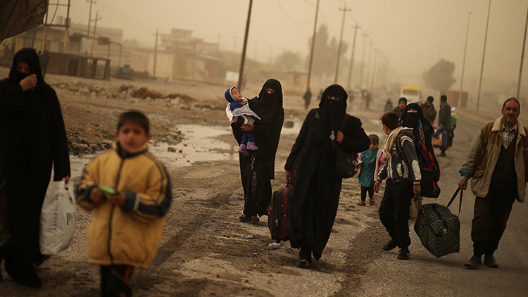 El invierno acecha a Mosul: Los residentes de la ciudad se preparan para la hambruna y el frío