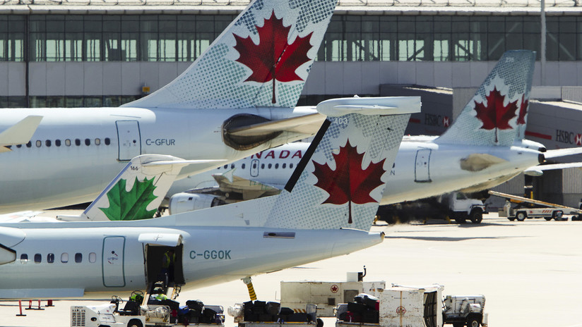 FOTO: Teléfono se incendia a bordo de un avión dejando un herido en Canadá