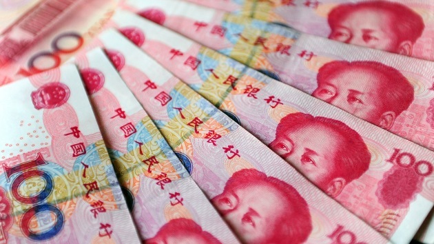 Jaque al dólar: El uso del yuan chino en el comercio internacional creció un 50% en 2012