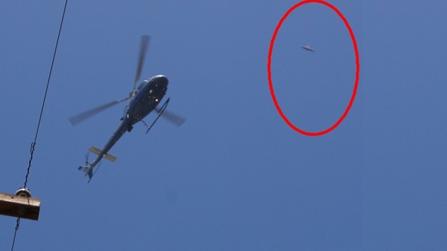 Captan imagen de un ovni, volando junto a un helicóptero de la Policía en Los Ángeles