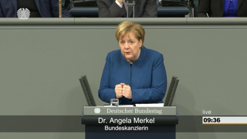 Zwischen Applaus und Gelächter: Merkel verteidigt globalen Migrationspakt als "kompromisslos"