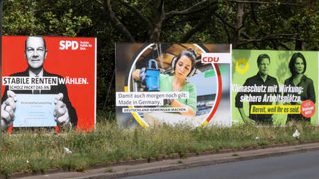 An den Straßen auf und nieder, hängen die Plakate wieder