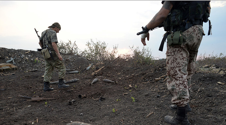 E. Ukraine rebels withdraw lighter weapons from front line