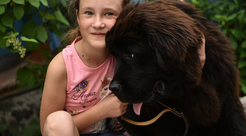 Putin makes Kyrgyz girl's wish come true, gives rare dog as gift