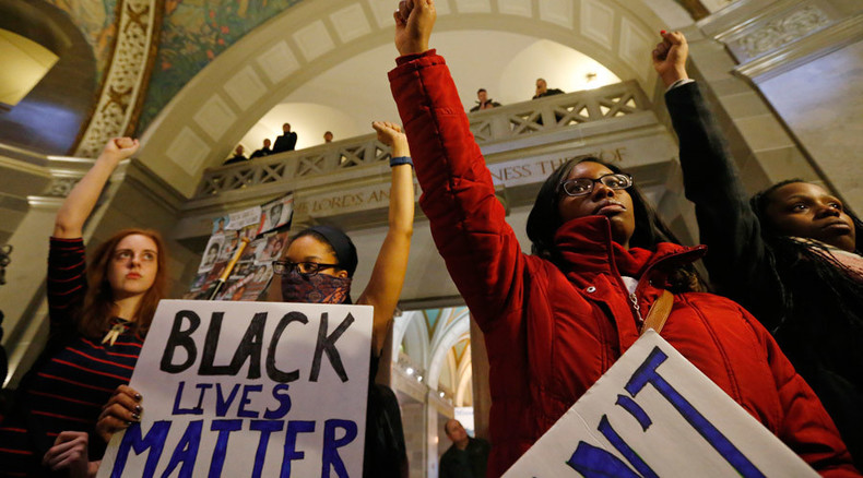 Arrests, violence at Ferguson town hall as protesters confront mayor, clash with police