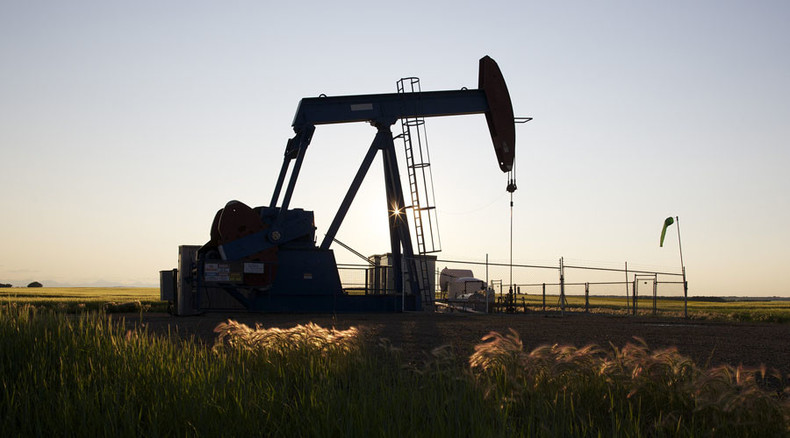 Oil balances around $50 after hitting 6-month low