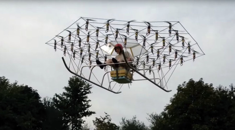 British man builds helicopter from 54 drones & garden chair (VIDEO)