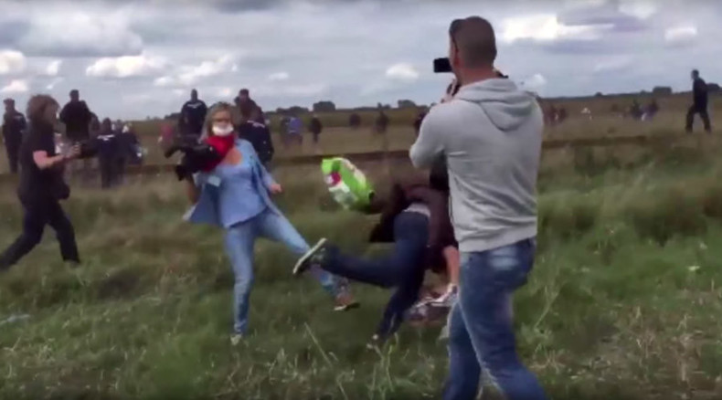 Hungarian journalist fired after kicking, tripping up refugees on video