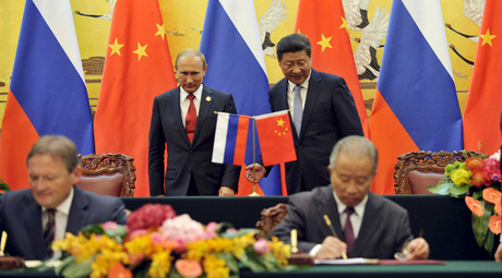 Energy goes east as Russia and China seal multibillion dollar deals in Beijing