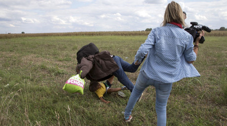 ‘My life is ruined’: Refugee-tripping Hungarian camerawoman to sue Facebook, may move to Russia 