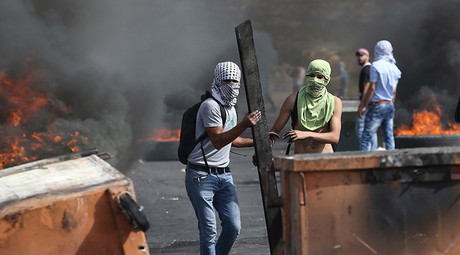 Kerry links Israeli violence to settlement building, Israel seals off Arab E. Jerusalem