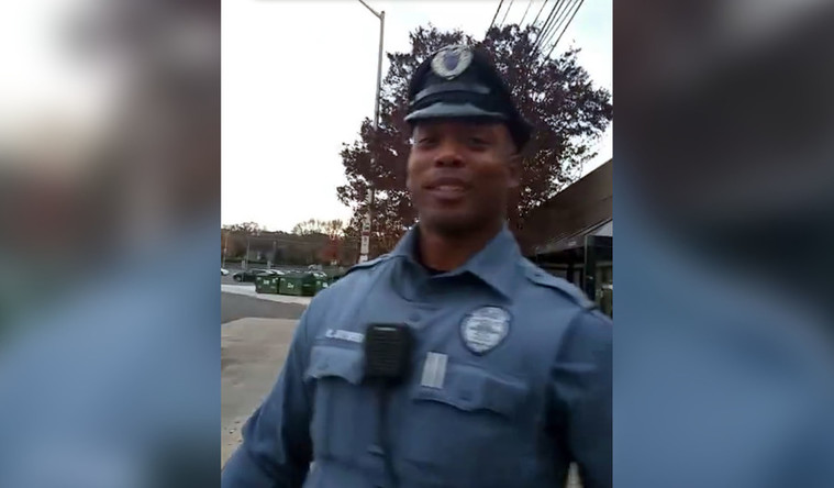 Delaware cop caught... giving shoes to barefoot homeless man (VIDEO)