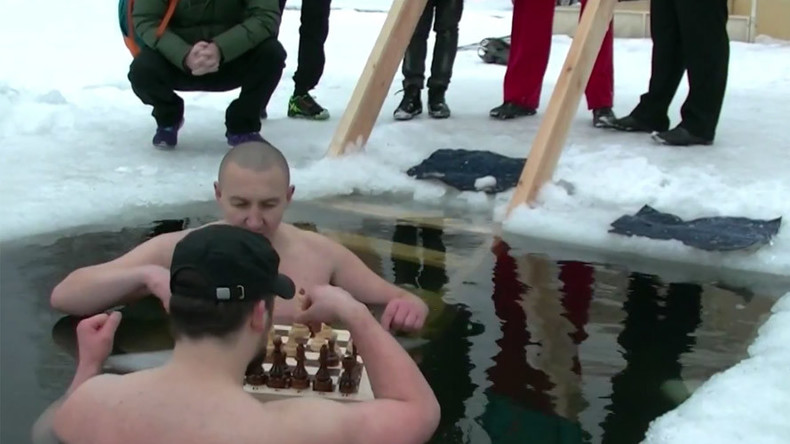 Ice-bucket challenge, Russian style: Swimmers play chess in frozen lake (VIDEO)