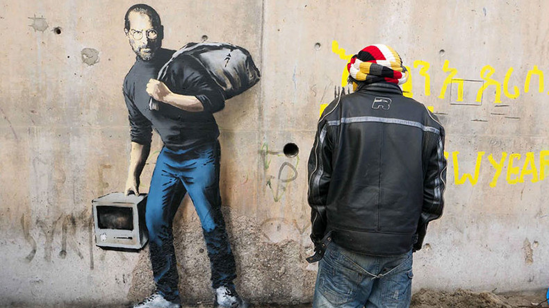 Banksy’s ‘Steve Jobs the Son of Syrian Migrant’ pops up in Calais camp