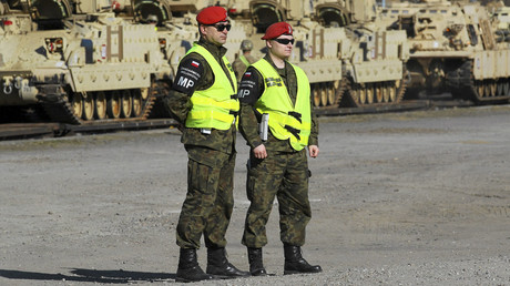 Poland sends troops to enforce ‘dismissal’ of NATO intel center head 
