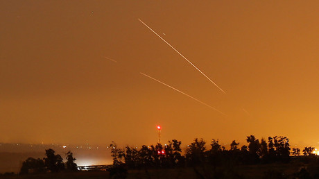 Missiles fly over Israeli-Lebanese border after killing of Hezbollah commander in Syria