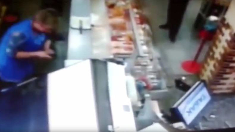 Not today, Death! Worker avoids shop shelf crush (VIDEO)