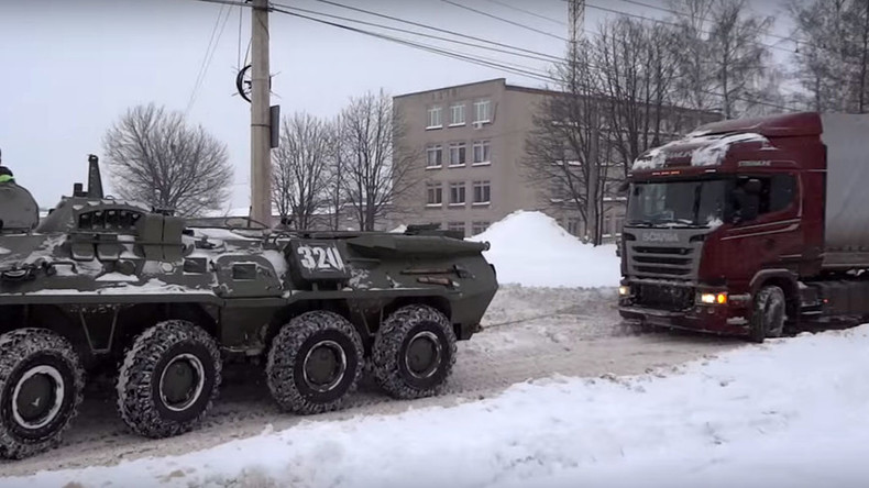 Snow job: Russian army tows 18-wheeler stuck in blizzard