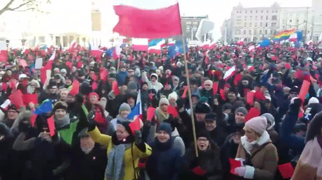 Polish protesters slap government with red card for enacting controversial laws