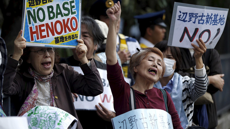 Up to 30,000 flock to Japan parliament to protest US base relocation in Okinawa 