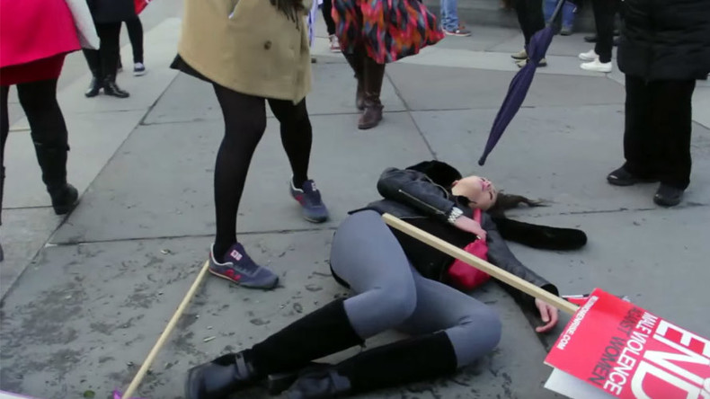 Joke too far? Pranksters ‘bottle’ women at domestic abuse demo (VIDEO)