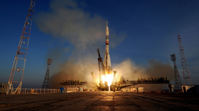 Soyuz docks with Intl Space Station, sends 3 new crewmembers aboard