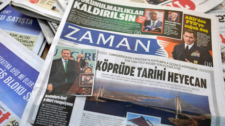 1st edition of Turkish Zaman daily after govt takeover sees smiling Erdogan on front page