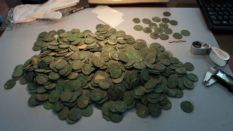 Half a ton of 1,700 yro Roman coins found hidden in jars in Seville