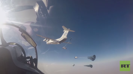 Russian Su-30 jets escort UN aid delivery to ISIS-besieged Syrian town (VIDEO)