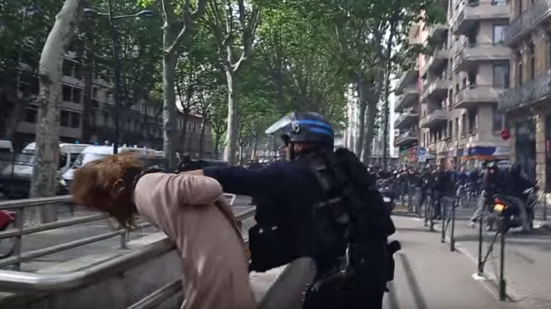 VIDEO: Policeman grabs woman by throat, slams her down, as French clashes escalate
