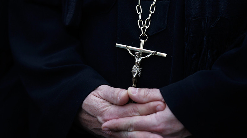 Coptic Christian priest killed in 'hail of bullets' outside Egyptian church