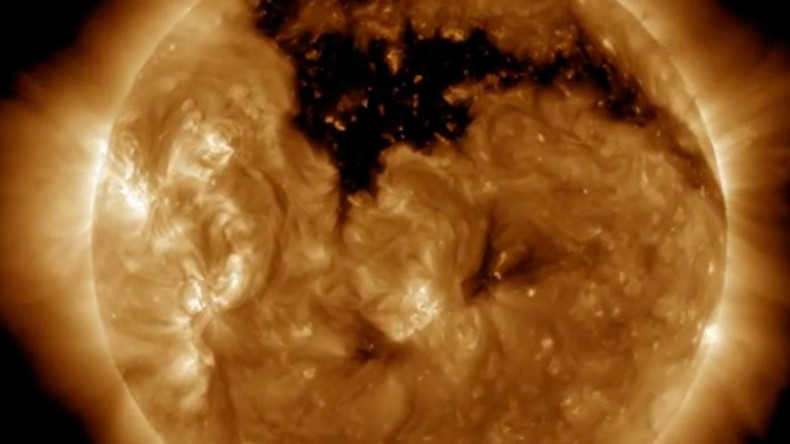 NASA discovers giant hole growing on the sun’s surface (VIDEO)