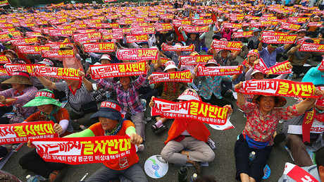 Thousands of S. Koreans protest US missile defense system as Seoul announces location