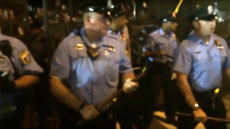 DNC protesters, police clash; 7 arrested jumping security fence