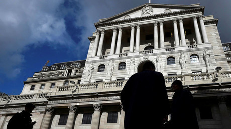 UK cuts interest rates for first time in seven years, extends QE
