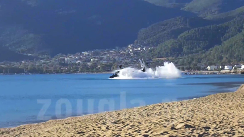 Apache helicopter slams nose-down into sea during exercise in Greece (VIDEO)