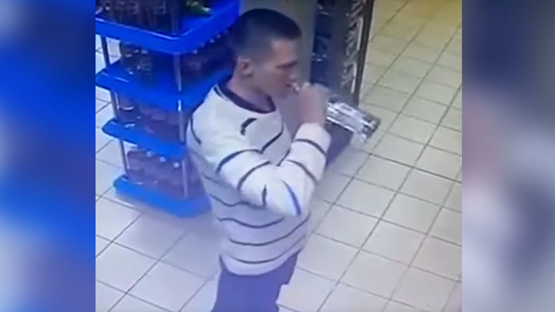Russian man’s stomach-churning vodka theft caught on CCTV (VIDEO)