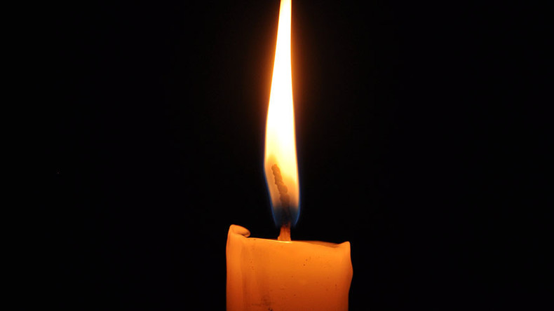 Candle blaze kills woman, prompts anger over Spanish energy prices