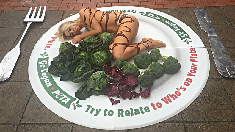 Turkey breast? Topless PETA protester poses as poultry slice in Christmas demonstration