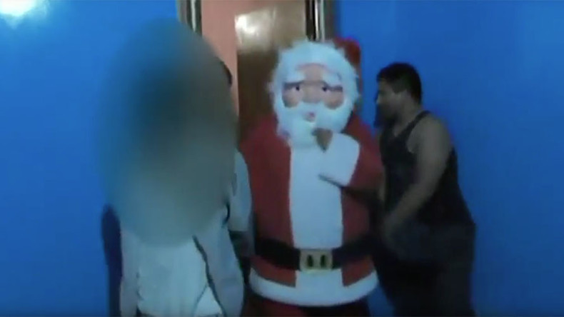 Secret Santa, Peru-style: Police dress up as Father Christmas to raid drug dealer’s house (VIDEO)