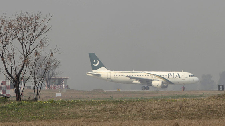 Sacrifice for safety? Pakistani airline staff behead goat on runway before flight (GRAPHIC PHOTO)