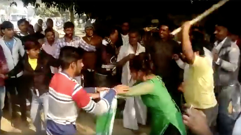 Woman beaten with stick in India for resisting sexual assault (VIDEO)