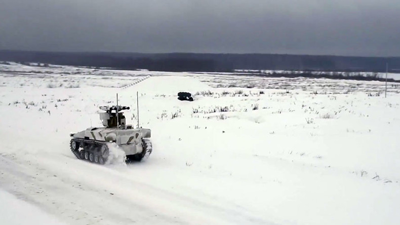 Russian combat robots conquer snowy battlefield in drill outside Moscow (VIDEO)