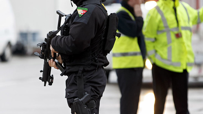 Armed & 'dangerous' gunman located in Switzerland after shooting 2 policemen