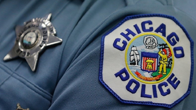 Off-duty Chicago officer stripped of powers after fatally shooting unarmed Hispanic man