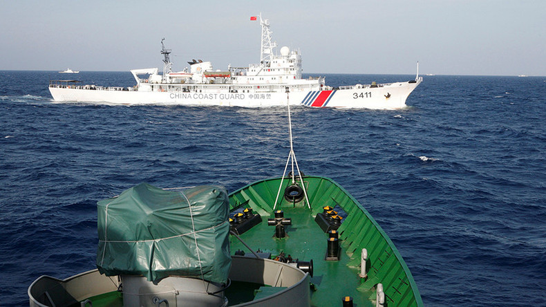 China, Vietnam pledge to settle differences over South China Sea claims