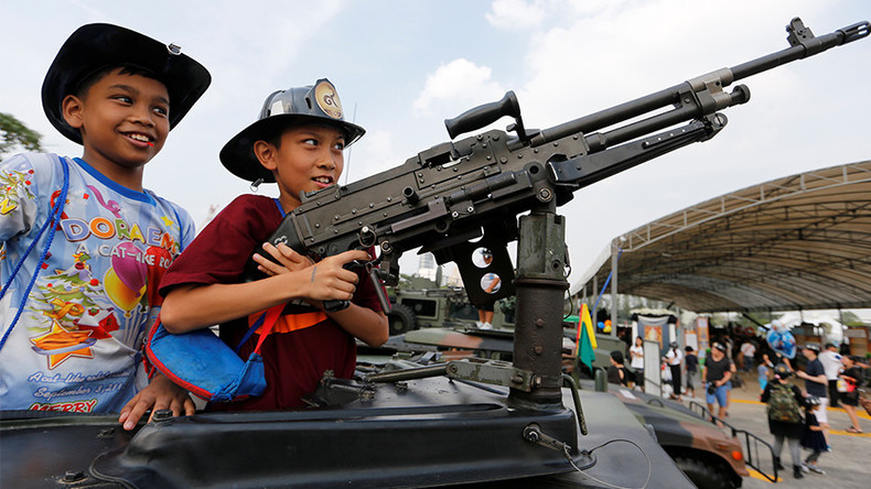 Machine guns are child’s play during Thai National Children’s Day (VIDEO)