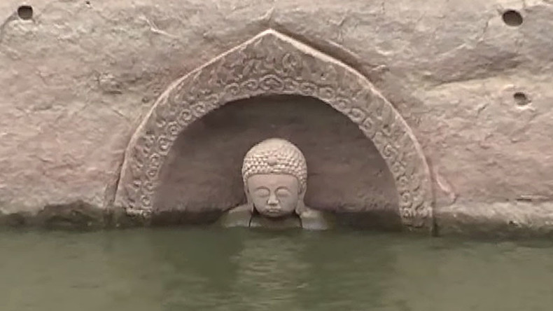600yo Buddha statue uncovered in Chinese reservoir (VIDEO)