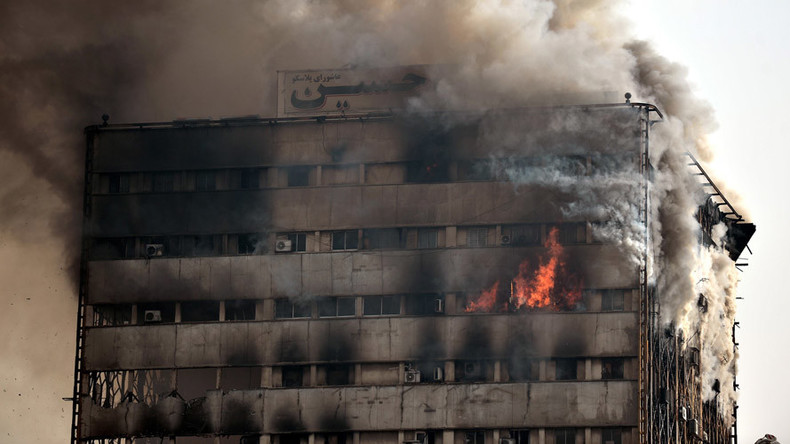 ‘Like a horror movie’: at least 20 feared dead after blaze topples Tehran’s oldest high-rise  